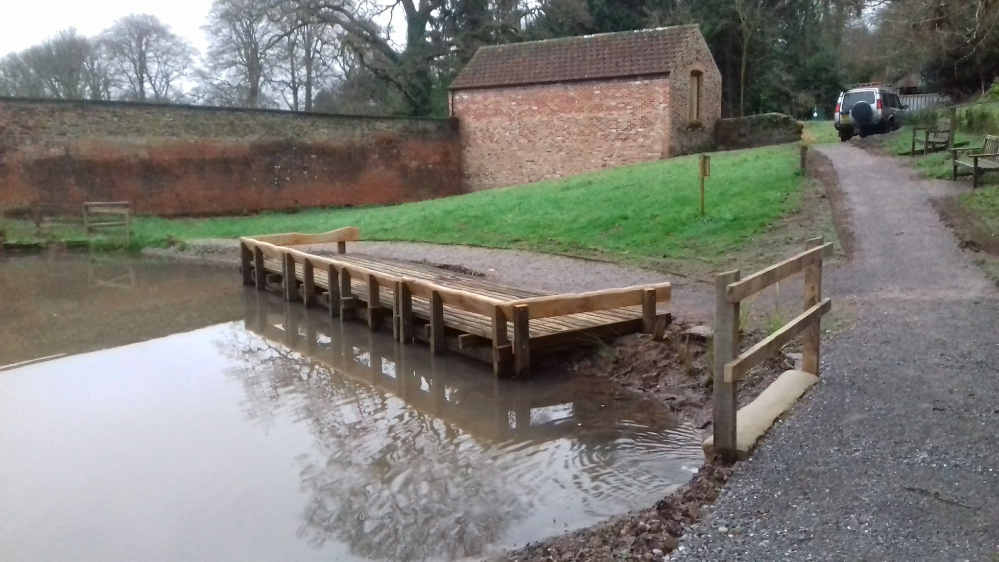 wooden pond dipping platform